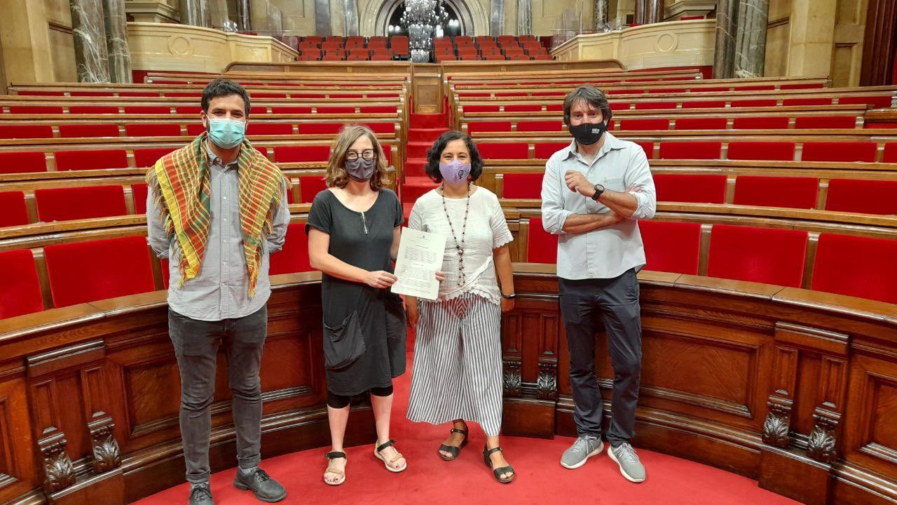 Membres dels quatre grups que han participat de la proposta de resolució.